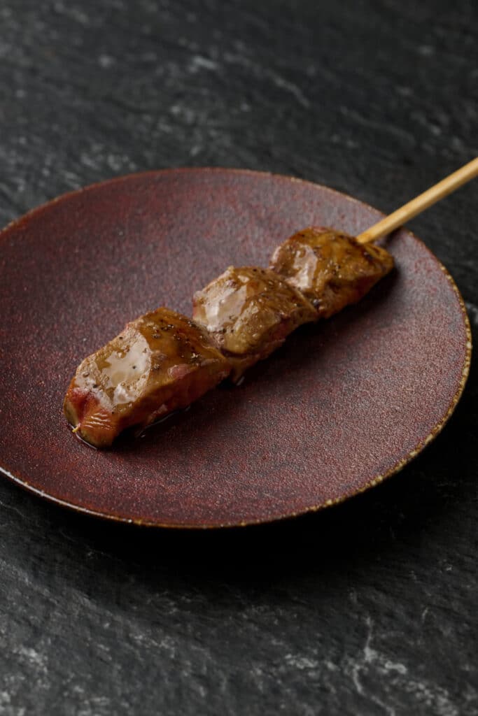 Ryu Shunsuke preparing yakitori at Fumée