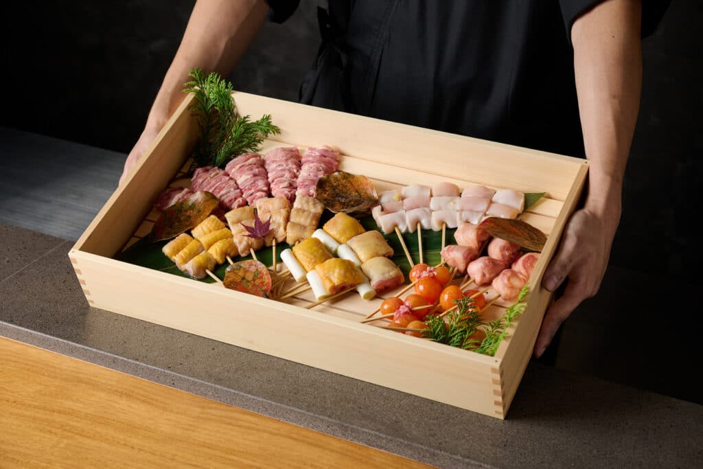Ryu Shunsuke preparing yakitori at Fumée